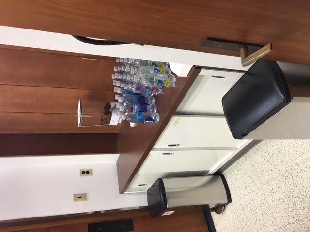 Open and space corporate office rest area with counter and bar area